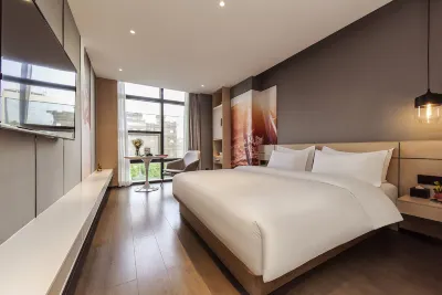 Heye Youth Travel Homestay (Xi'an Huimin Street Bell Tower Subway Station) Отели в г. 