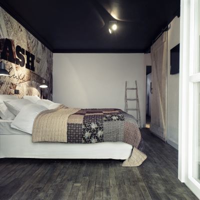 Deluxe Quadruple Room Trash Deluxe Promo Code