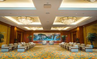 The large room is equipped with carpet and chairs, making it suitable for hosting events or formal functions at Guoce International Conference and Exhibition Center