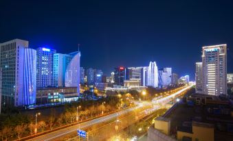Shenlan Holiday Apartment (Qingdao Thumb Plaza)