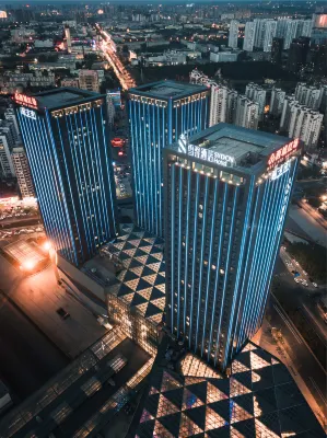 Xueli Hotel (Harbin West High-speed Railway Station Wanda Plaza) Hotéis em 
