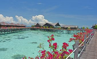 The lagoon at an island is home to beautiful white sand beaches and clear blue water at Sipadan Kapalai Dive Resort