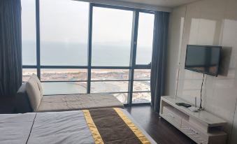 Golden Coast Seaview Holiday Apartment (Qingdao Chengshi Yangtai Naluwan)