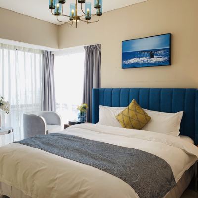 觀海雙臥陽光公館大套房 麒韻飯店公寓（青島萬象城五四廣場店）優惠