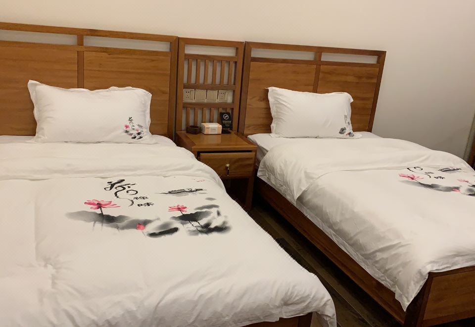 Xinlongmen GuesthouseGuestroom