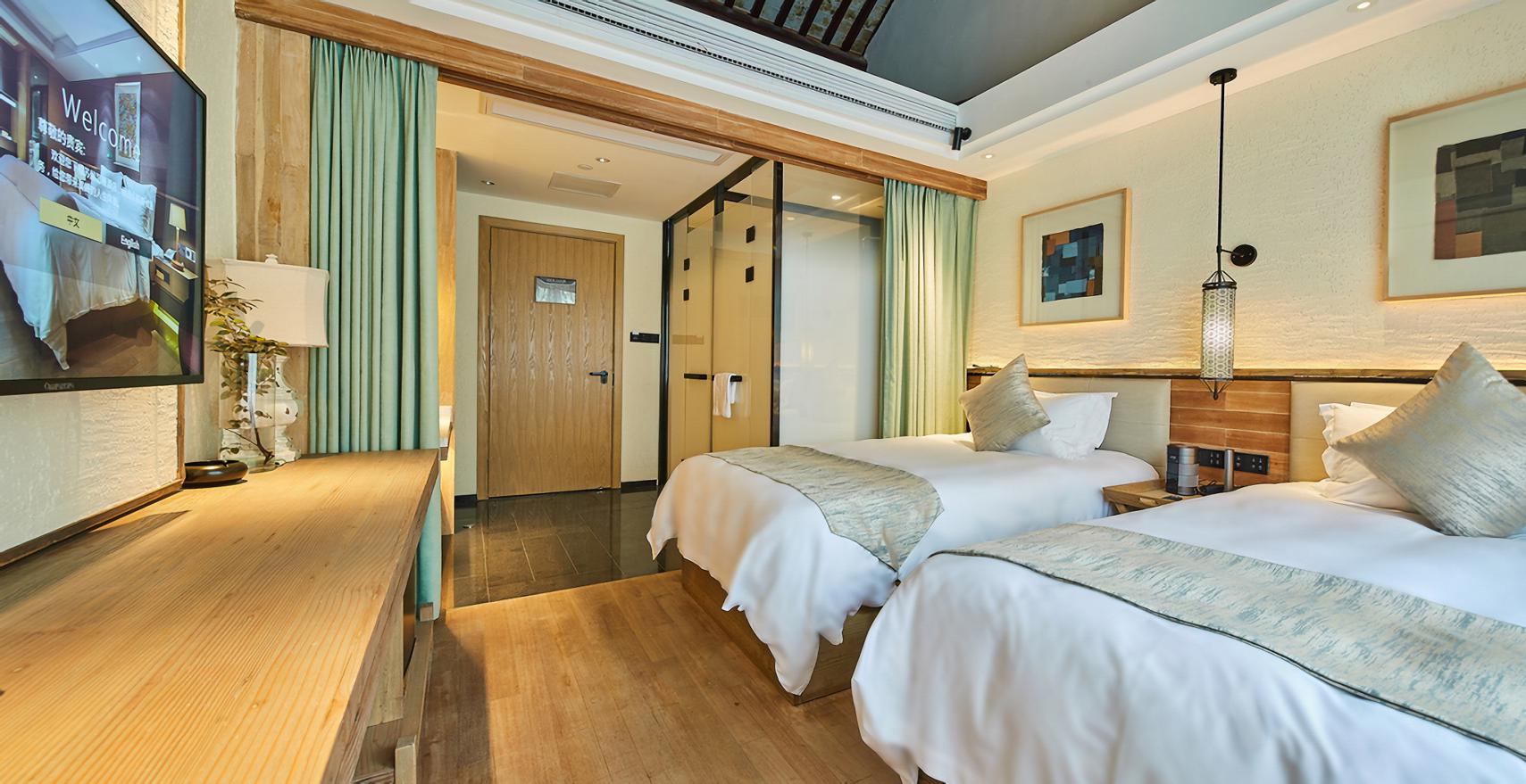 Yiman Hotel (Suzhou Guanqianjie Pingjiang Road Scenic Area)临河标准房（智能声控+小冰箱+乐家衞浴）