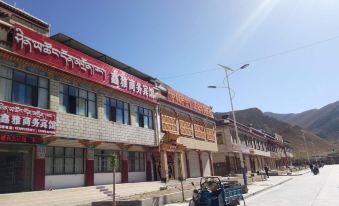 Dingri Xinya Business Hotel