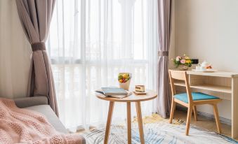 Dongxing Ruyi Hotel - Housity