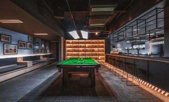 The hotel offers an entertainment center that includes a game room with pool tables and other amenities at Desti Youth Park Hostel (Xi'an Bell Tower)
