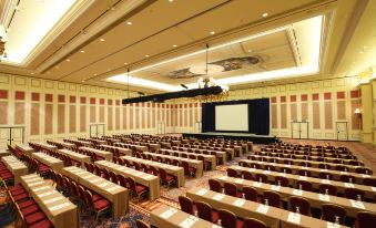 room with chairs and a podium at The Venetian Macao