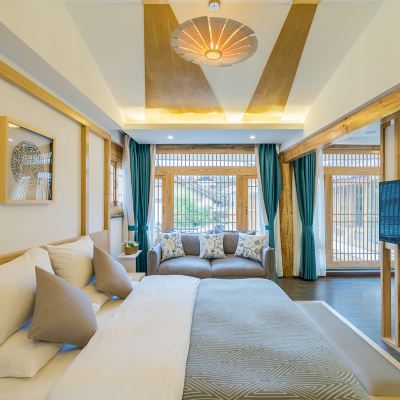 觀自在·花園景觀套房（地暖） 麗江無華回顧·Free·設計師.dream.遊隱美學·泳池美宿（麗江古城中心店）優惠