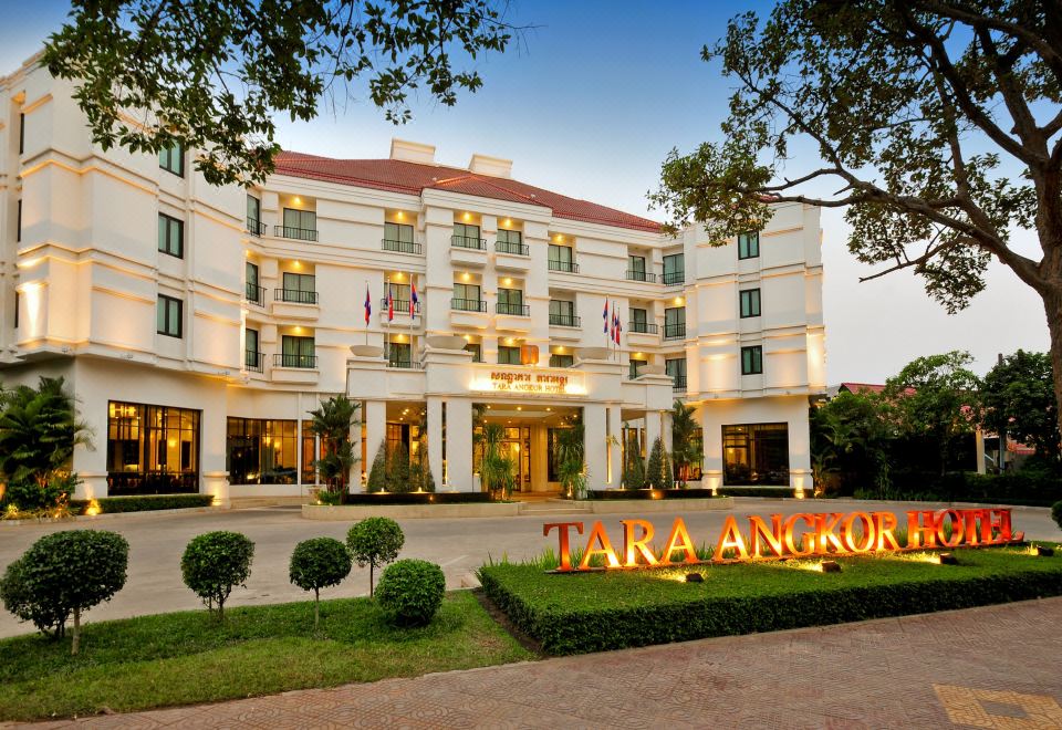 "a large hotel building with a sign that reads "" tara angkor "" in front of it" at Tara Angkor Hotel