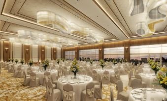 a large , elegant banquet hall filled with tables and chairs set up for a formal event at DoubleTree by Hilton Skopje