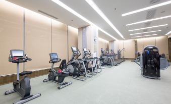A spacious room in the center with exercise equipment and cardio machines is also available at the International Trade City, Yiwu - Marriott Executive Apartments