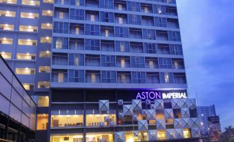 "a tall , modern hotel building with a sign that reads "" aston imperial "" on the side" at ASTON Imperial Bekasi Hotel & Conference Center