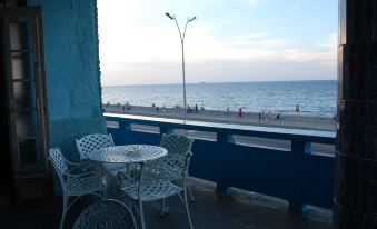 House In Front of The Sea