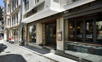 "a brick building with a sign that reads "" kyoto restaurant "" prominently displayed on the front" at Hotel the Public - Special Category