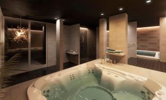 a modern bathroom with a large bathtub and shower , as well as a sink and toilet at Best Western Plus Hus 57