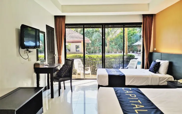 ห้องดีลักซ์ เตียงแฝด พร้อมวิวสระว่ายน้ำ