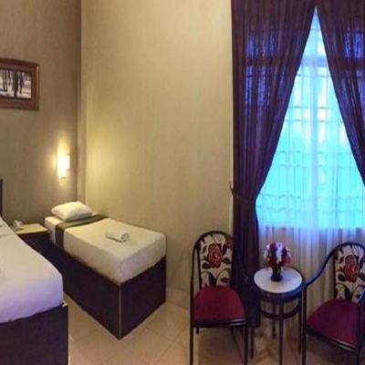 Bilik Keluarga Kupon QAS Hotel