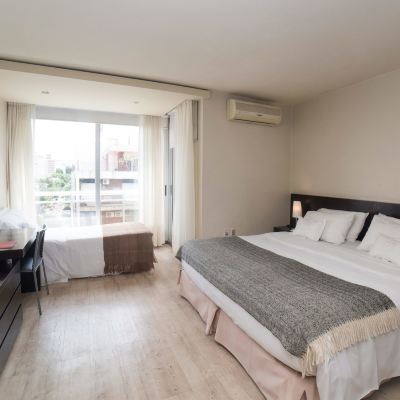 Standard Triple Room with Balcony and City View