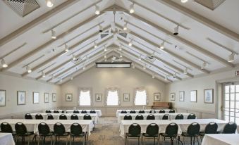 a large conference room with rows of chairs and tables , set up for a meeting or event at Pine Mountain State Resort Park