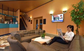 Hotel Am Schlossberg - Housity