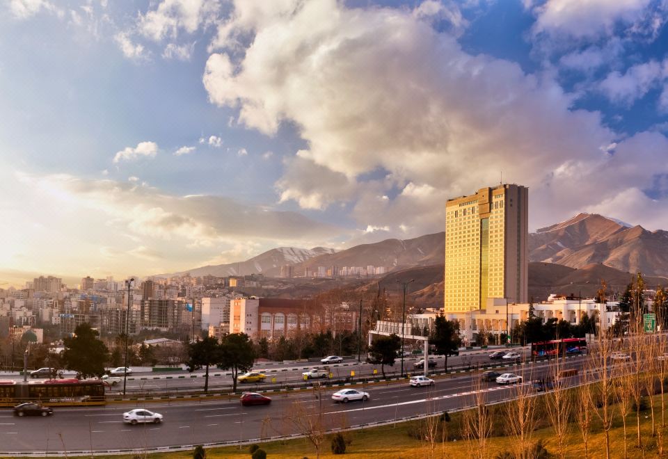 urban landscape with bustling activity at Parsian Azadi Hotel