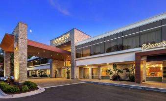 "a large hotel with a red roof and the name "" doubletree by hilton "" displayed above the entrance" at The Kingsley Bloomfield Hills - a DoubleTree by Hilton