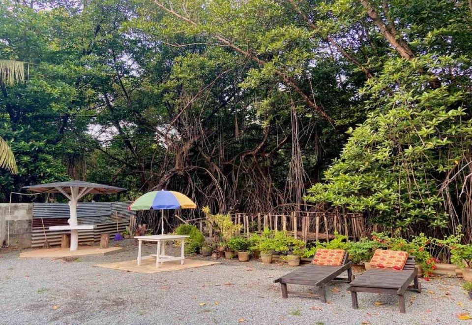 Hotel Dilu River Villa, Exterior, Garden