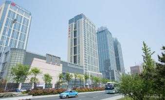 Tuyuan Holiday Apartment (Weihai Railway Station Hanlefang West Street)