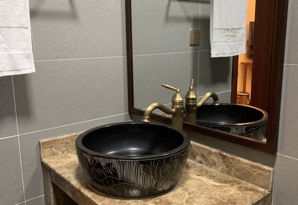 Xinlongmen GuesthouseGuestroom