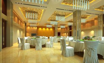 a large banquet hall with multiple dining tables and chairs set up for a formal event at Dynasty Hotel