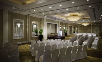 A spacious event room at the hotel or conference, arranged with rows of chairs at Marco Polo Hongkong Hotel