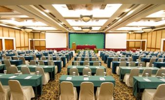 a large conference room with rows of chairs arranged in a semicircle , ready for a meeting at Lorin Dwangsa Solo Hotel