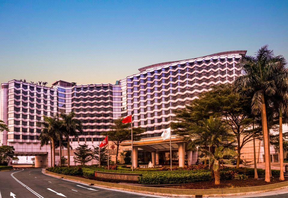 A hotel is a large building with an exterior view and its name displayed at the front at Harbour Plaza Metropolis