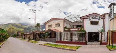 Hotel Los Laureles Отели в г. 